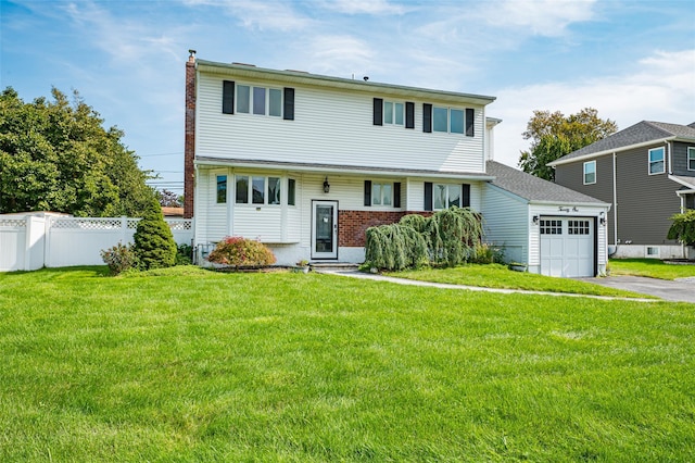 21 Clifford Blvd, Hauppauge, NY 11788 - view of front facade with an attached garage, a chimney, and driveway