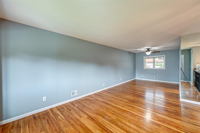 21 Clifford Blvd, Hauppauge, NY 11788 - unfurnished room with wood finished floors and ceiling fan