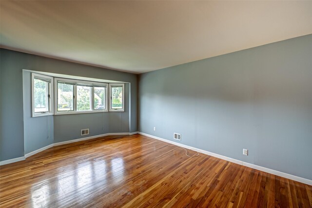 21 Clifford Blvd, Hauppauge, NY 11788 - unfurnished room with wood finished floors