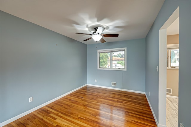 21 Clifford Blvd, Hauppauge, NY 11788 - empty room with a ceiling fan and wood finished floors