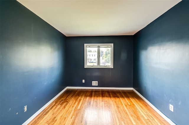 21 Clifford Blvd, Hauppauge, NY 11788 - unfurnished room featuring hardwood / wood-style flooring and baseboards