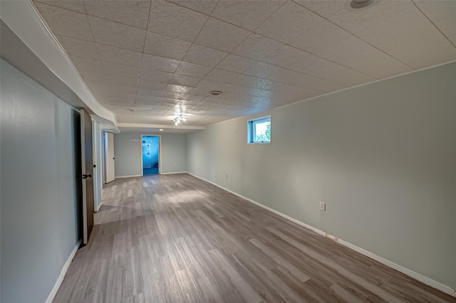 21 Clifford Blvd, Hauppauge, NY 11788 - empty room featuring wood finished floors and baseboards