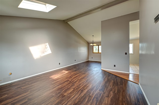 21 Clifford Blvd, Hauppauge, NY 11788 - empty room featuring dark wood-type flooring, a chandelier, and a skylight