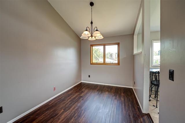 21 Clifford Blvd, Hauppauge, NY 11788 - unfurnished room featuring healthy amount of natural light, a chandelier, wood finished floors, and lofted ceiling