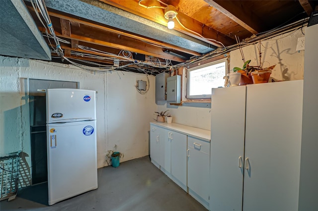 21 Clifford Blvd, Hauppauge, NY 11788 - basement featuring freestanding refrigerator and electric panel