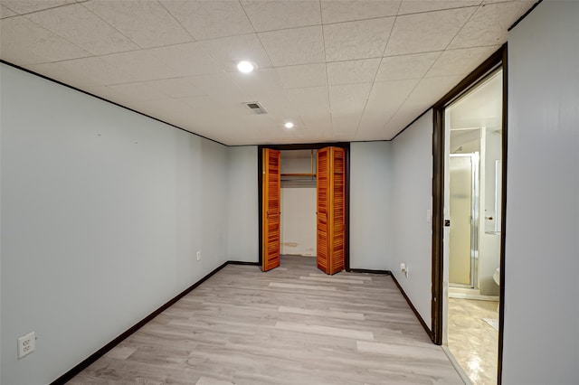21 Clifford Blvd, Hauppauge, NY 11788 - unfurnished bedroom with light wood-type flooring, a closet, and recessed lighting