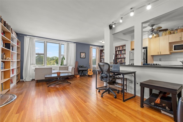 5425 Valles Ave Unit 5G, Bronx, NY 10471 - home office featuring healthy amount of natural light, light wood-type flooring, and ceiling fan