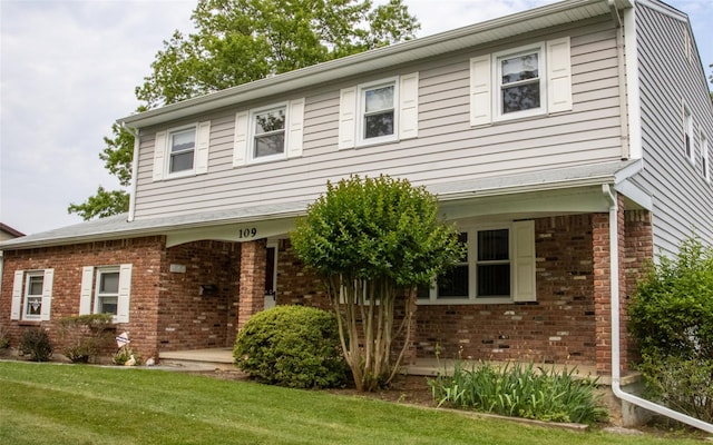 109 Lester Dr, Tappan, NY 10983 - view of front of property with brick siding and a front lawn