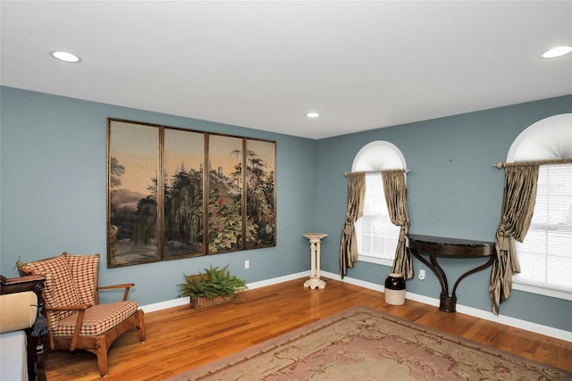 15 Howard Ct, Plainview, NY 11803 - living area featuring wood finished floors and recessed lighting