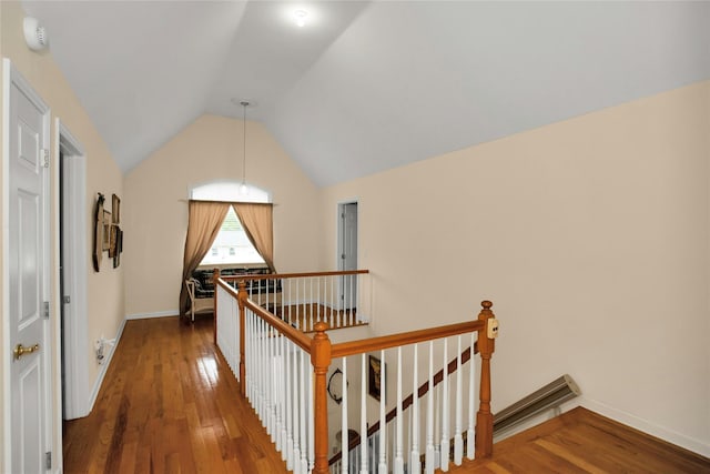 15 Howard Ct, Plainview, NY 11803 - hallway featuring an upstairs landing, wood finished floors, and lofted ceiling