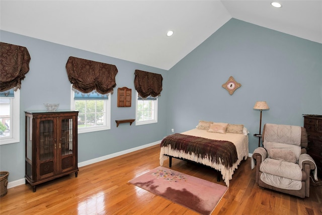 15 Howard Ct, Plainview, NY 11803 - bedroom featuring lofted ceiling, wood finished floors, and recessed lighting