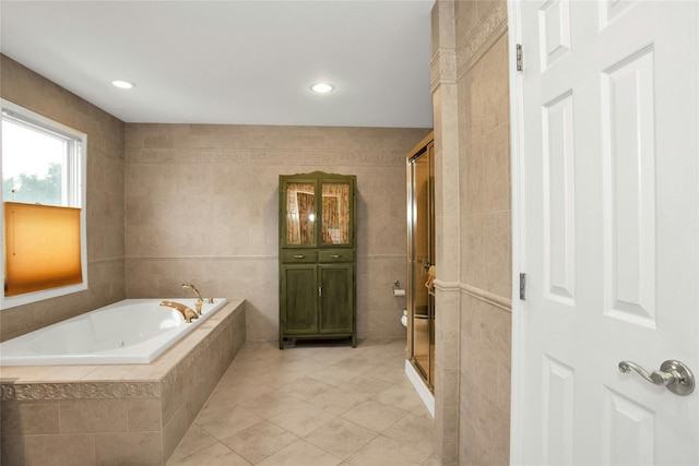 15 Howard Ct, Plainview, NY 11803 - bathroom with a garden tub, a stall shower, tile patterned flooring, tile walls, and recessed lighting