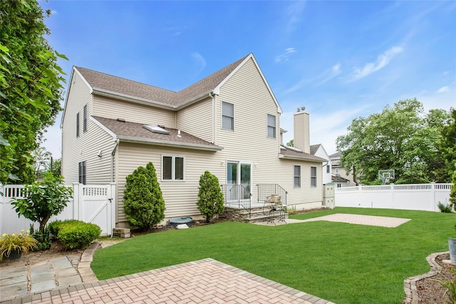 15 Howard Ct, Plainview, NY 11803 - back of property with a patio area, a fenced backyard, a gate, and roof with shingles
