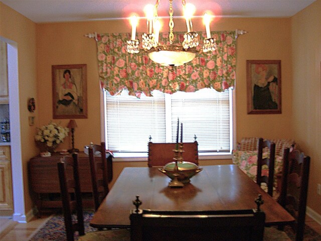 15 Howard Ct, Plainview, NY 11803 - dining room featuring a chandelier and healthy amount of natural light