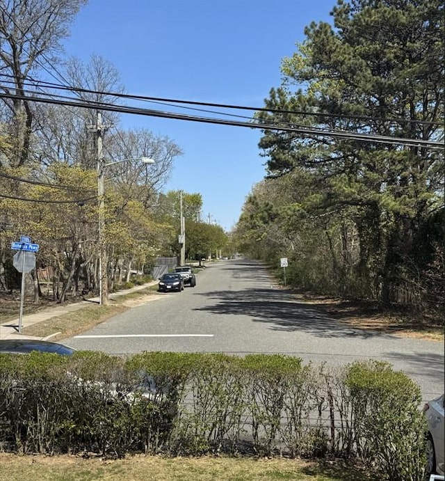 756 Bohemia Pkwy, Sayville, NY 11782 - view of asphalt road with traffic signs