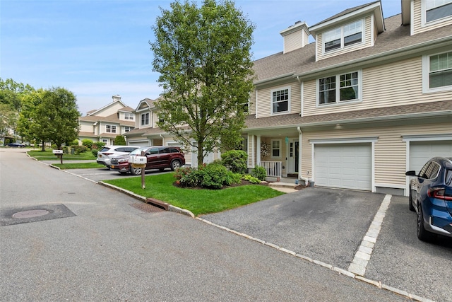 97 Hillcrest Ln, Peekskill, NY 10566 - multi unit property featuring a shingled roof and driveway