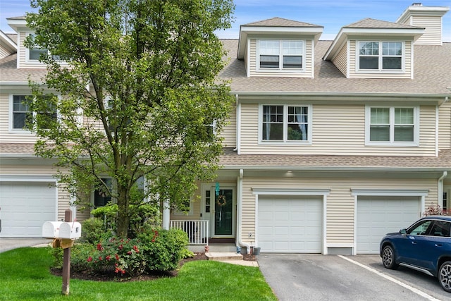 97 Hillcrest Ln, Peekskill, NY 10566 - view of property featuring an attached garage and a shingled roof