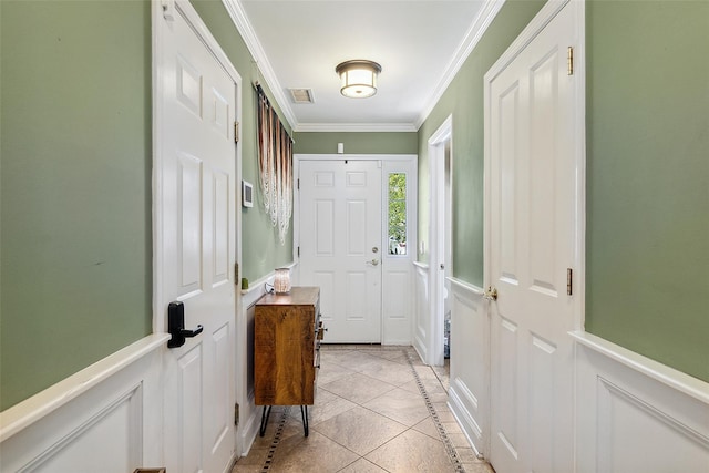 97 Hillcrest Ln, Peekskill, NY 10566 - doorway featuring ornamental molding, wainscoting, light tile patterned floors, and inlaid floor details