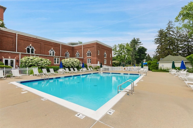97 Hillcrest Ln, Peekskill, NY 10566 - community pool featuring a patio area