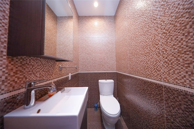 1768 W 5th St, Brooklyn, NY 11223 - half bathroom featuring tile walls and a sink