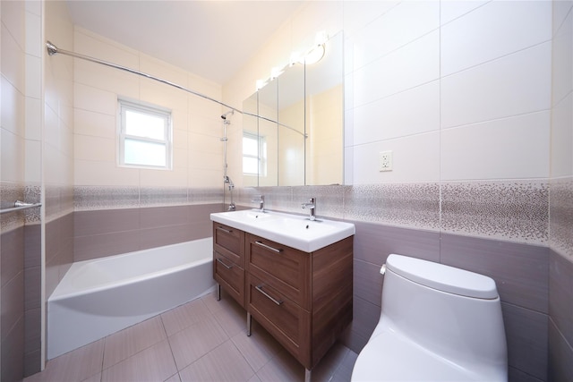 1768 W 5th St, Brooklyn, NY 11223 - full bath with tile walls, vanity, tub / shower combination, and tile patterned floors