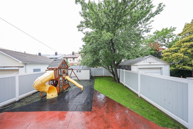 1768 W 5th St, Brooklyn, NY 11223 - fenced backyard with a playground and a shed