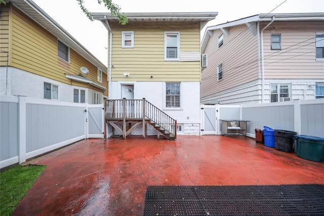 1768 W 5th St, Brooklyn, NY 11223 - back of house featuring a gate, a fenced backyard, and a patio area