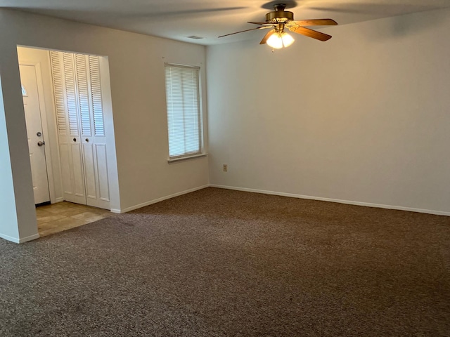 77 Birchwood Rd, Coram, NY 11727 - unfurnished bedroom featuring carpet, ceiling fan, and a closet