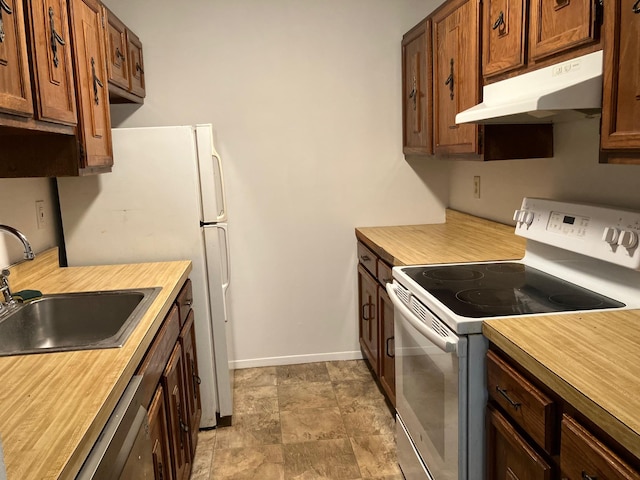 77 Birchwood Rd, Coram, NY 11727 - kitchen featuring white appliances, under cabinet range hood, and butcher block countertops