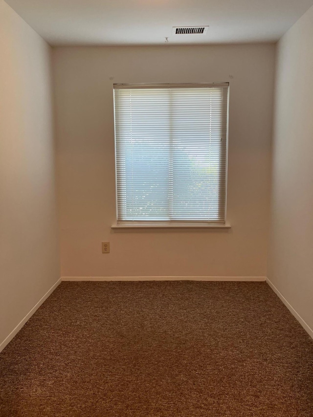 77 Birchwood Rd, Coram, NY 11727 - carpeted empty room featuring baseboards