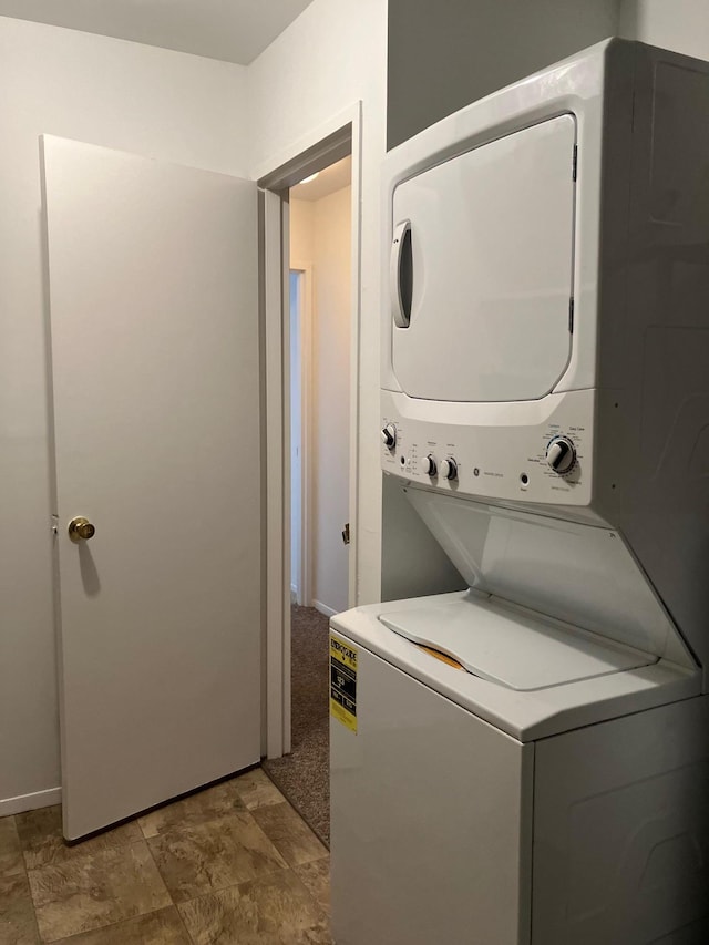 77 Birchwood Rd, Coram, NY 11727 - laundry room with stacked washer / drying machine