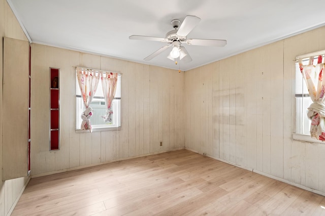 302 Waukena Ave, Oceanside, NY 11572 - unfurnished room with wood finished floors and a ceiling fan