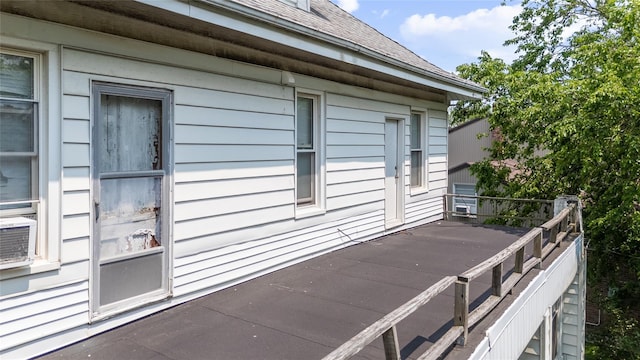 1020 New Mcneil Ave, Lawrence, NY 11559 - view of side of home with a shingled roof