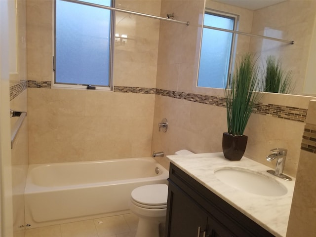 45-44 E 189th St, Flushing, NY 11368 - bathroom featuring vanity, tub / shower combination, tile patterned floors, and tile walls