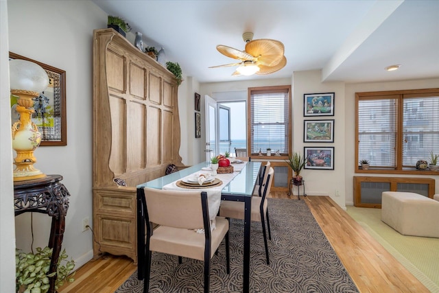 522 Shore Rd Unit 4Kk, Long Beach, NY 11561 - dining area featuring light wood-style flooring and baseboards