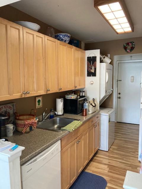 24 Village Park Dr Unit 3F, Fishkill, NY 12524 - kitchen featuring dishwasher, stacked washer and clothes dryer, and light brown cabinets