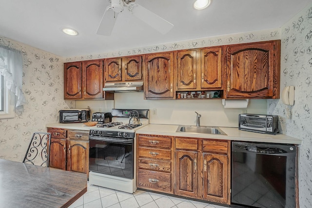 104 Cedarhurst Ave, Selden, NY 11784 - kitchen featuring range with gas stovetop, dishwasher, under cabinet range hood, light tile patterned floors, and light countertops
