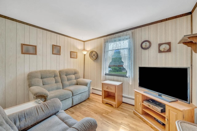 104 Cedarhurst Ave, Selden, NY 11784 - living area with baseboard heating, crown molding, and light wood-style floors