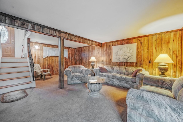 104 Cedarhurst Ave, Selden, NY 11784 - living room with wood walls, carpet, and stairway