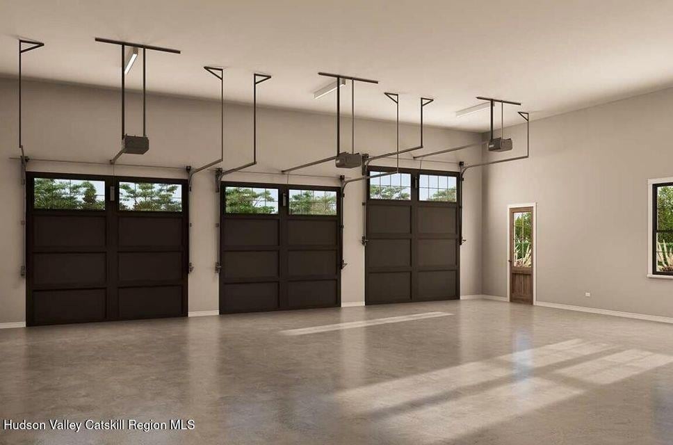 BeilkeRoad Beilke Road, Millerton, NY 12546 - garage with a garage door opener and baseboards