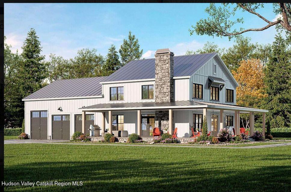 BeilkeRoad Beilke Road, Millerton, NY 12546 - back of house featuring covered porch, a chimney, a yard, a standing seam roof, and a metal roof