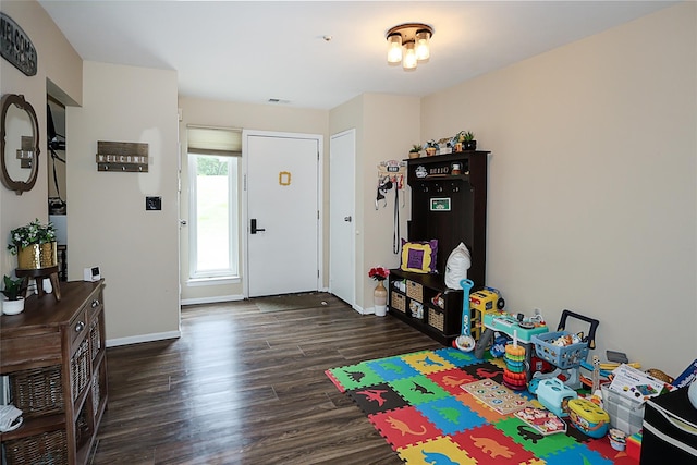 15 Juniper Ct Unit 15, Selden, NY 11784 - recreation room featuring wood finished floors and baseboards