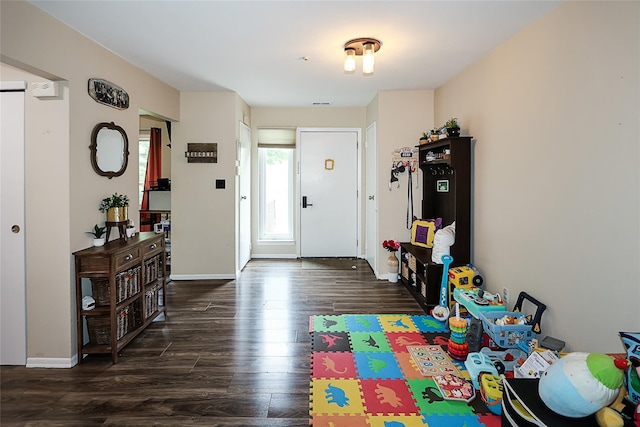 15 Juniper Ct Unit 15, Selden, NY 11784 - foyer with dark wood-type flooring and baseboards
