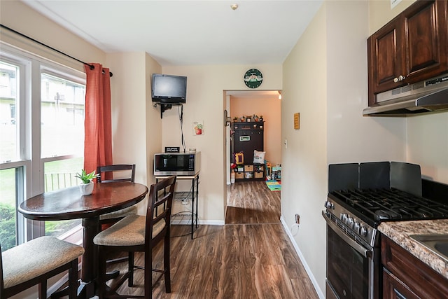 15 Juniper Ct Unit 15, Selden, NY 11784 - dining room featuring dark wood finished floors and plenty of natural light