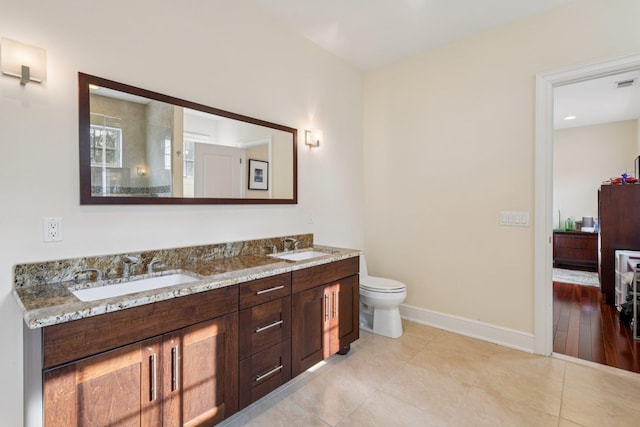 4 Celestial Ct, Saint James, NY 11780 - bathroom featuring double vanity and tile patterned floors