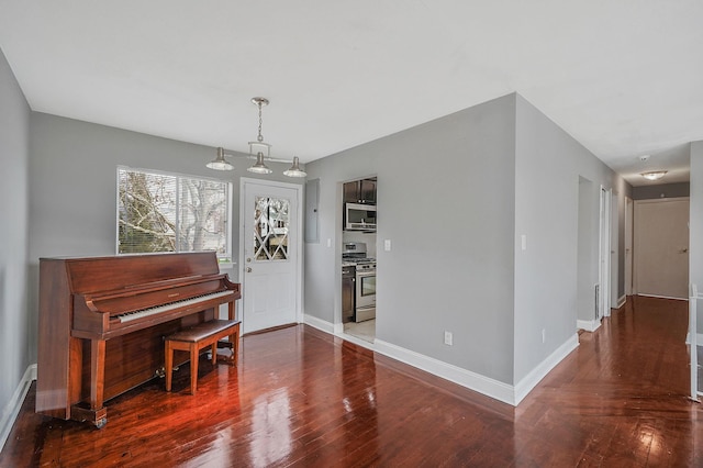 15 Bart Dr, Selden, NY 11784 - foyer with hardwood / wood-style flooring and baseboards