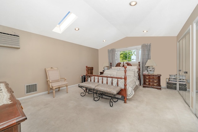 159-23 90th St, Howard Beach, NY 11414 - bedroom featuring carpet, vaulted ceiling, a skylight, a wall unit AC, and recessed lighting