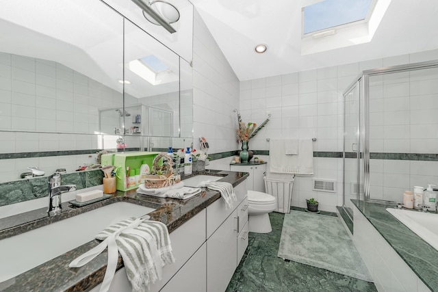 159-23 90th St, Howard Beach, NY 11414 - bathroom with a skylight, tile walls, lofted ceiling, vanity, and a shower stall