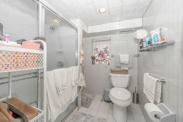 159-23 90th St, Howard Beach, NY 11414 - full bathroom featuring tile patterned flooring, tile walls, and a stall shower