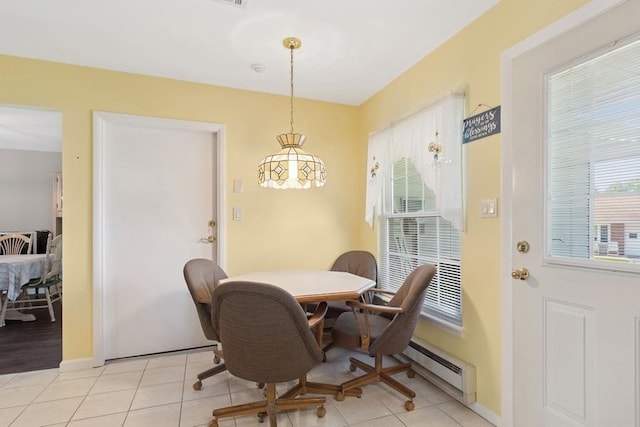 96 Enfield Ct Unit B, Ridge, NY 11961 - dining room with light tile patterned flooring and baseboards